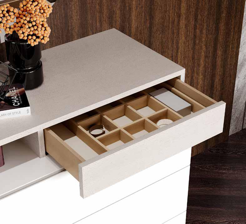 Cómoda Majestic com gavetas, num quarto